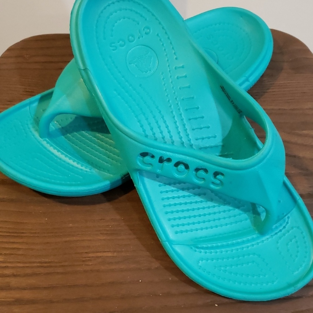 Teal Croc flip flops